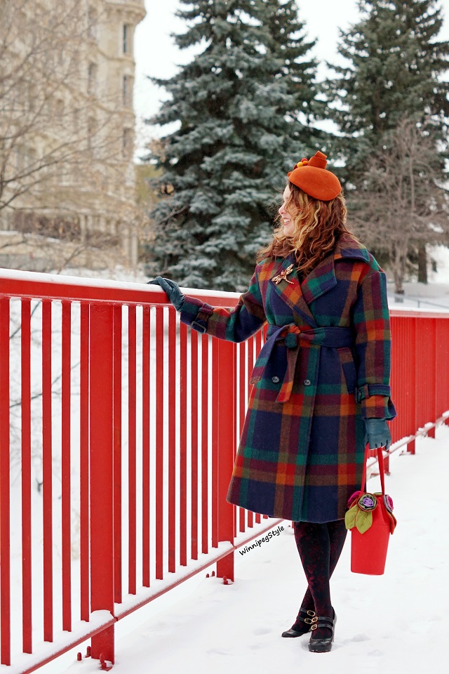 Winnipeg Style, Canadian Fashion stylist blog, Chicwish rainbow plaid wool trench coat, plaid multi color winter wool double breasted coat, Coque Millinery by Ericah wool orange ribbon pom pom Rebecca winter designer hat, Pierre Mantoux velvet black burgundy floral design tights nylons, Chie Mihara Tania black leather Mary Jane retro vintage style shoe, 2018